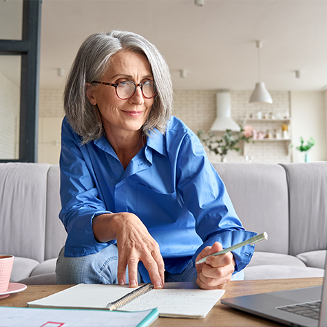 Older woman filling out paperwork