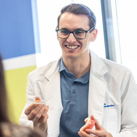 Orthodontist talking with a patient